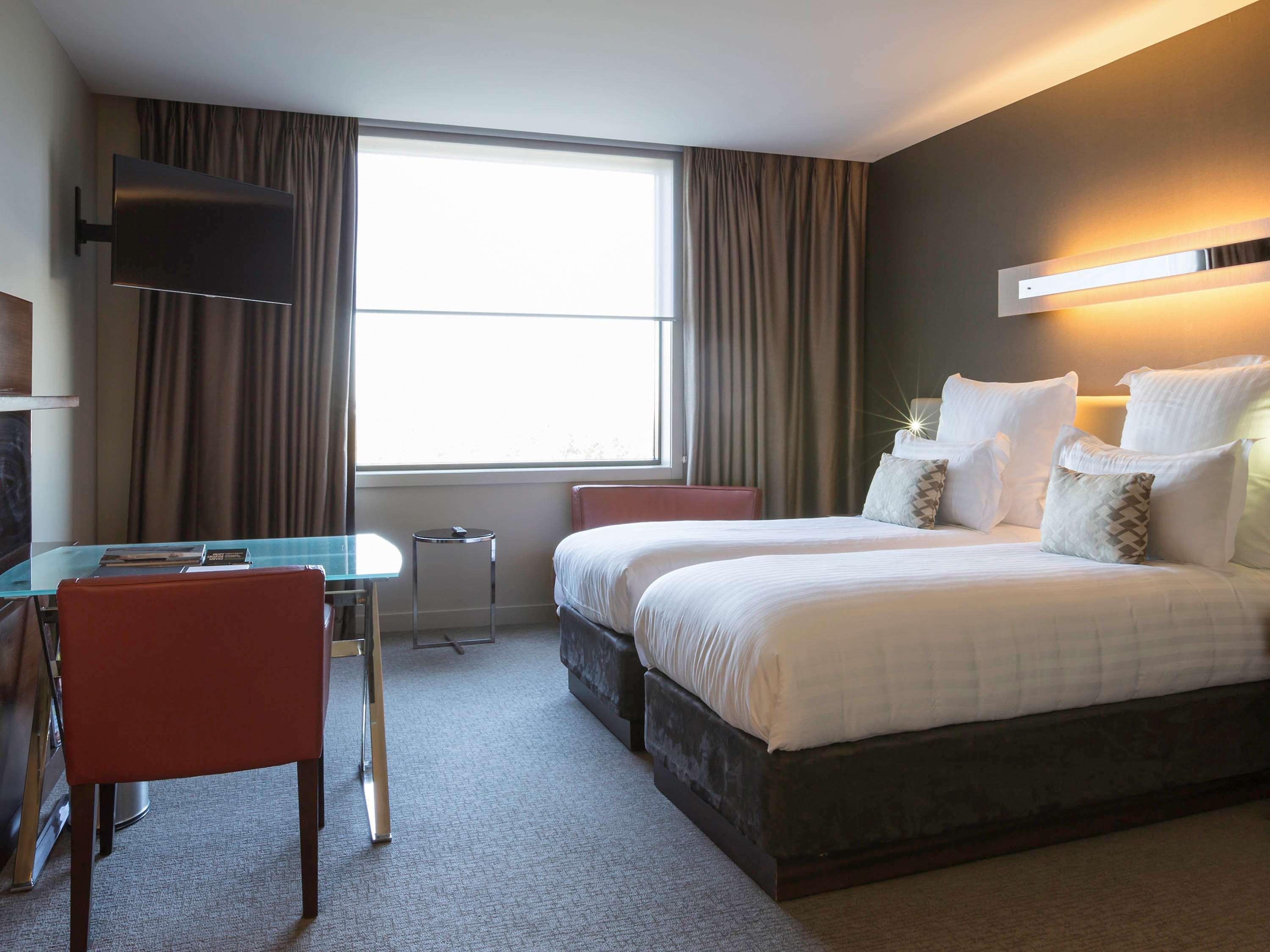 Hotel Pullman Sydney Olympic Park Exterior foto A room at the hotel
